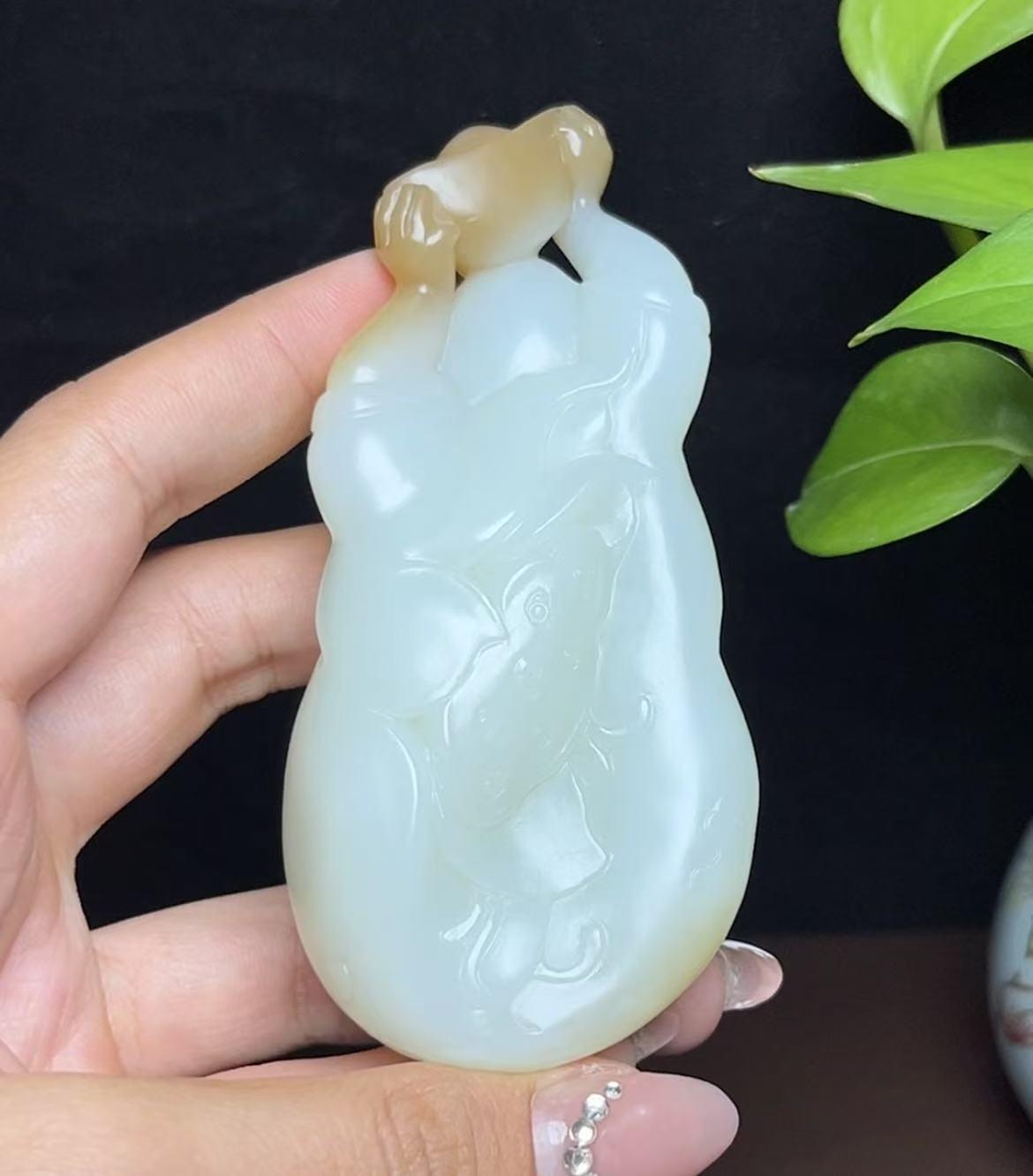 新疆和田玉且末糖白羊脂玉佛公手把件(162.7g)