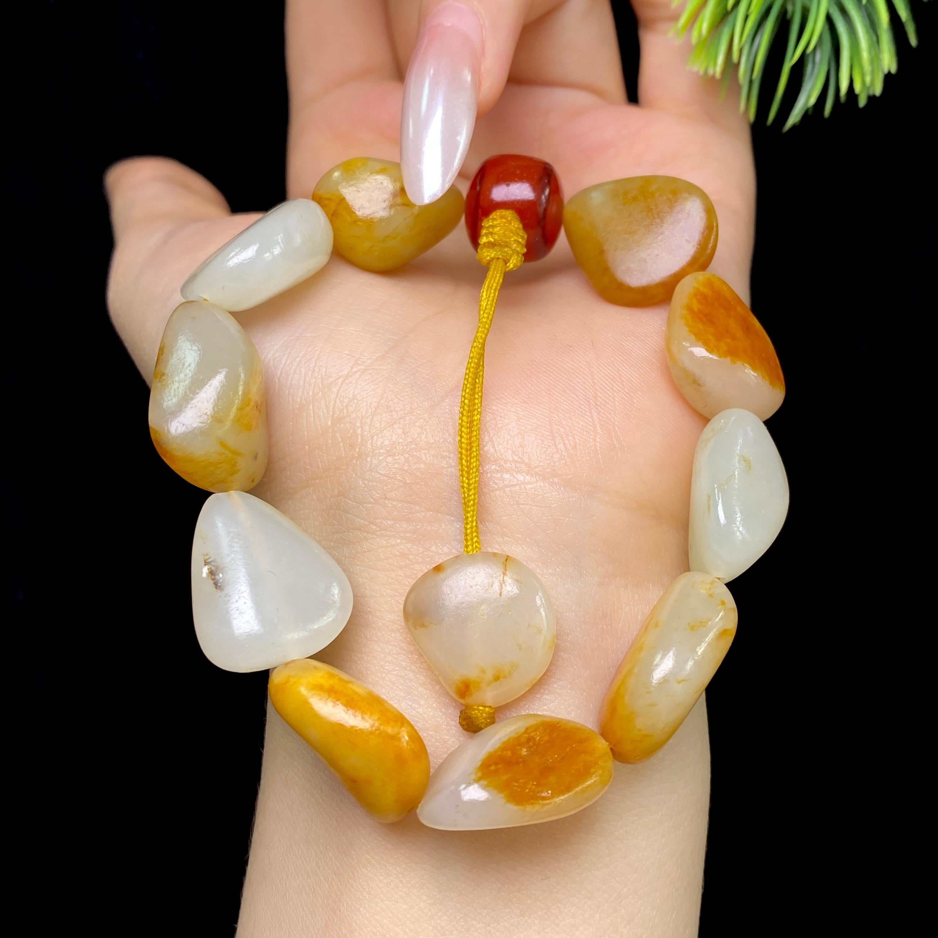 和田玉黄皮籽料手串（41.1g） – 厚德载玉