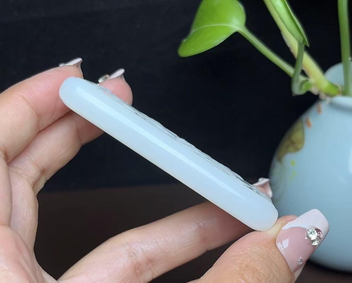 新疆和田玉米达料羊脂玉祥龙护主(54.5g)