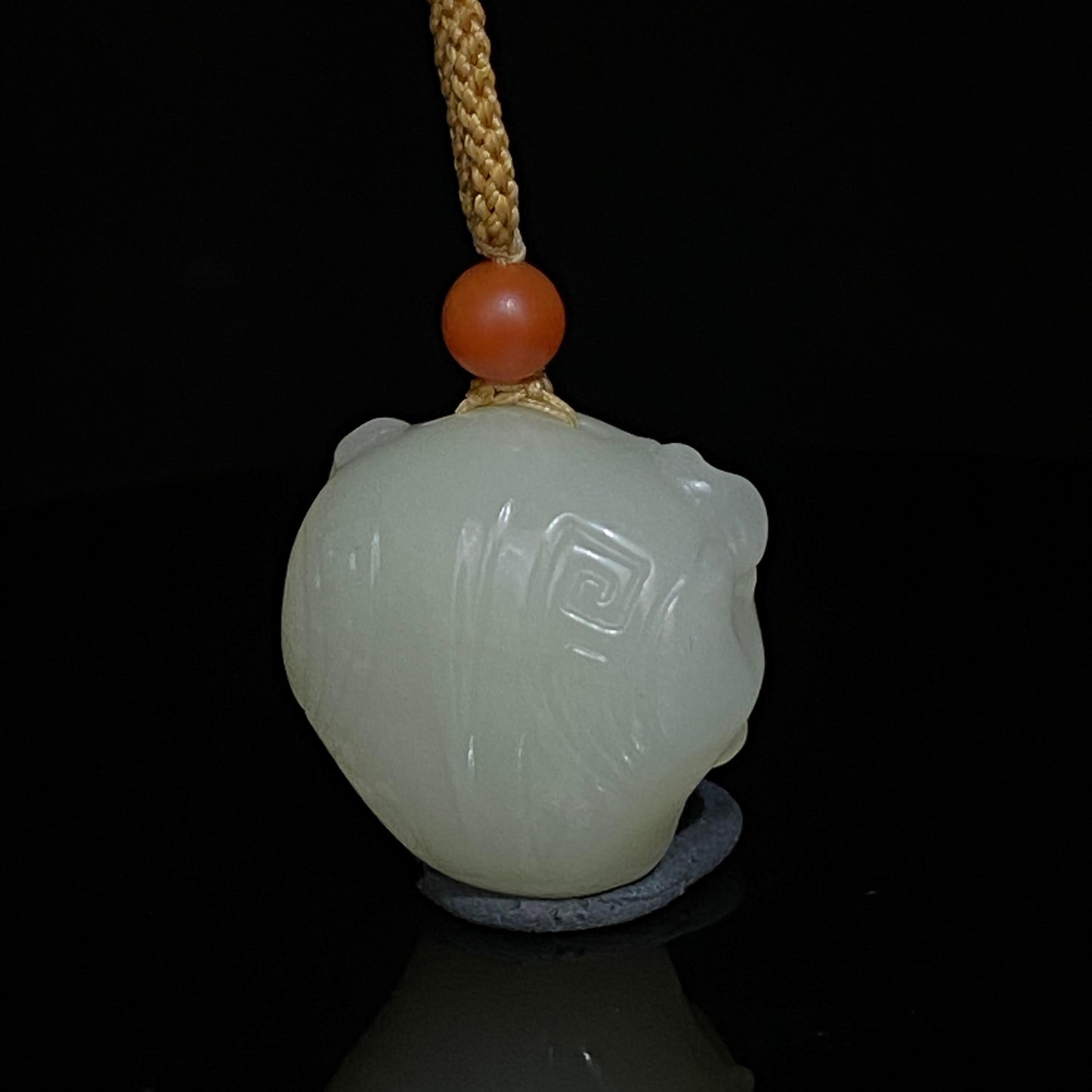 和田玉兽面挂件(16.26g)