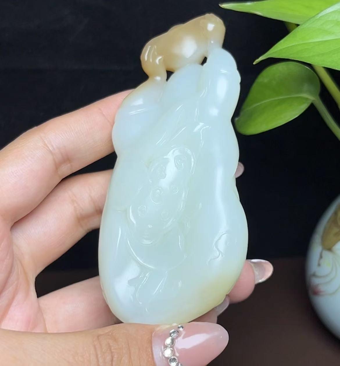 新疆和田玉且末糖白羊脂玉佛公手把件(162.7g)