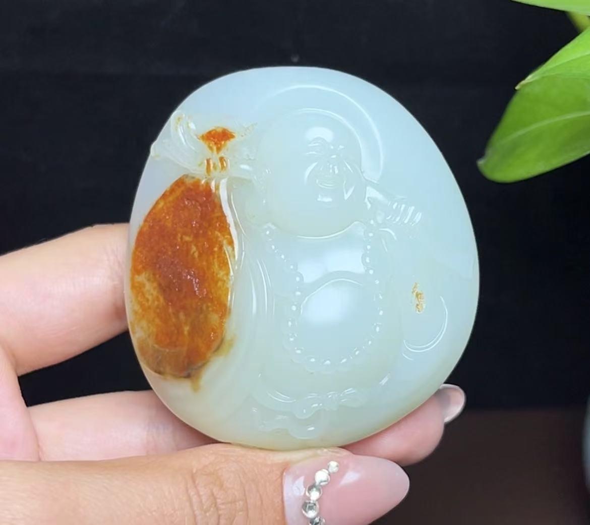 新疆和田玉籽料红皮白肉佛公(116.0g)