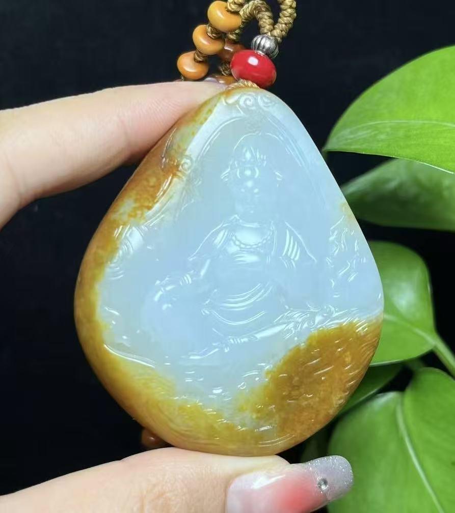 新疆和田玉红皮白肉羊脂玉籽料观音(102.5g)