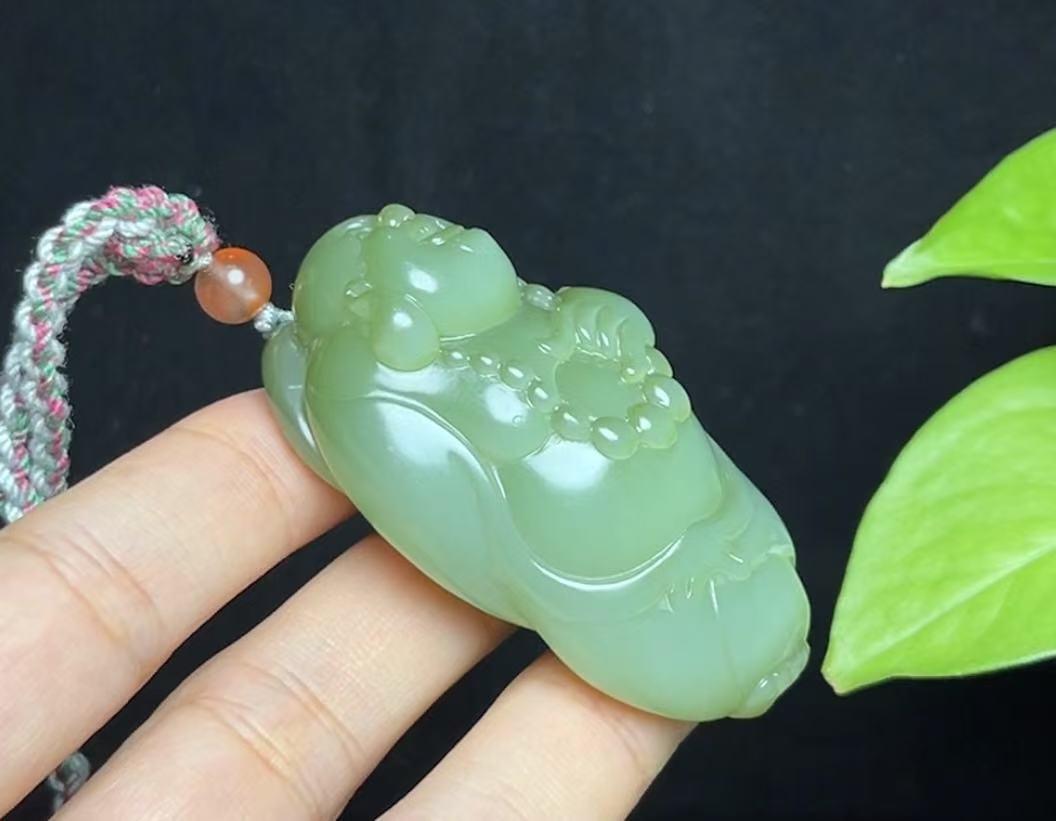 和田玉碧玉粉青猫眼佛公(73.6g)