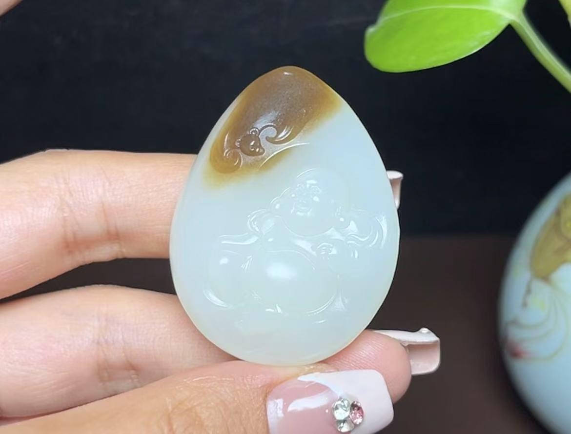 新疆和田玉且末糖白羊脂玉佛公(31.4g)