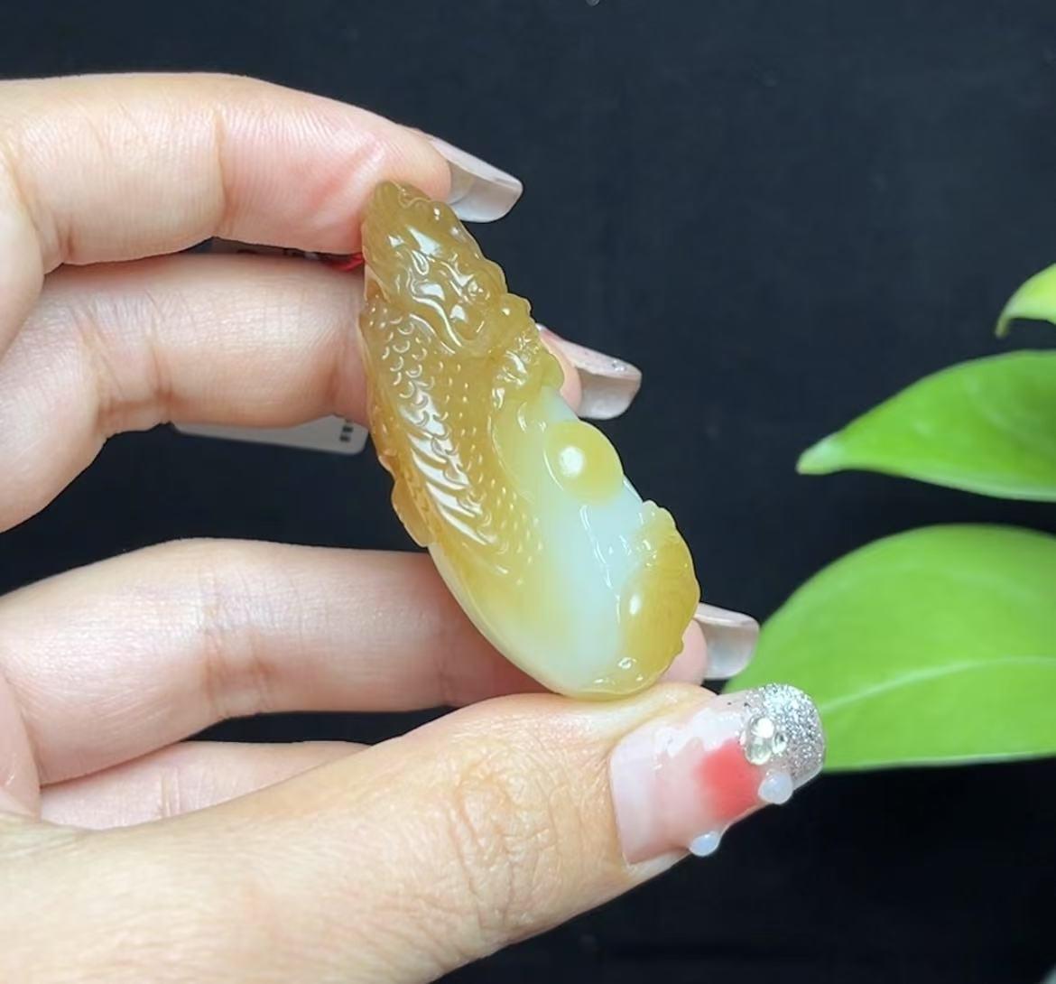 新疆和田玉且末糖羊脂玉望子成龙(39.4g)