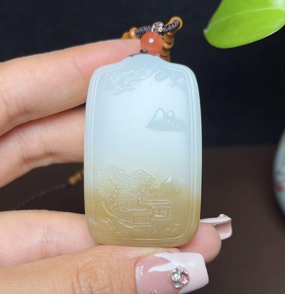 新疆和田玉且末糖白羊脂玉观音山水牌(38.2g)