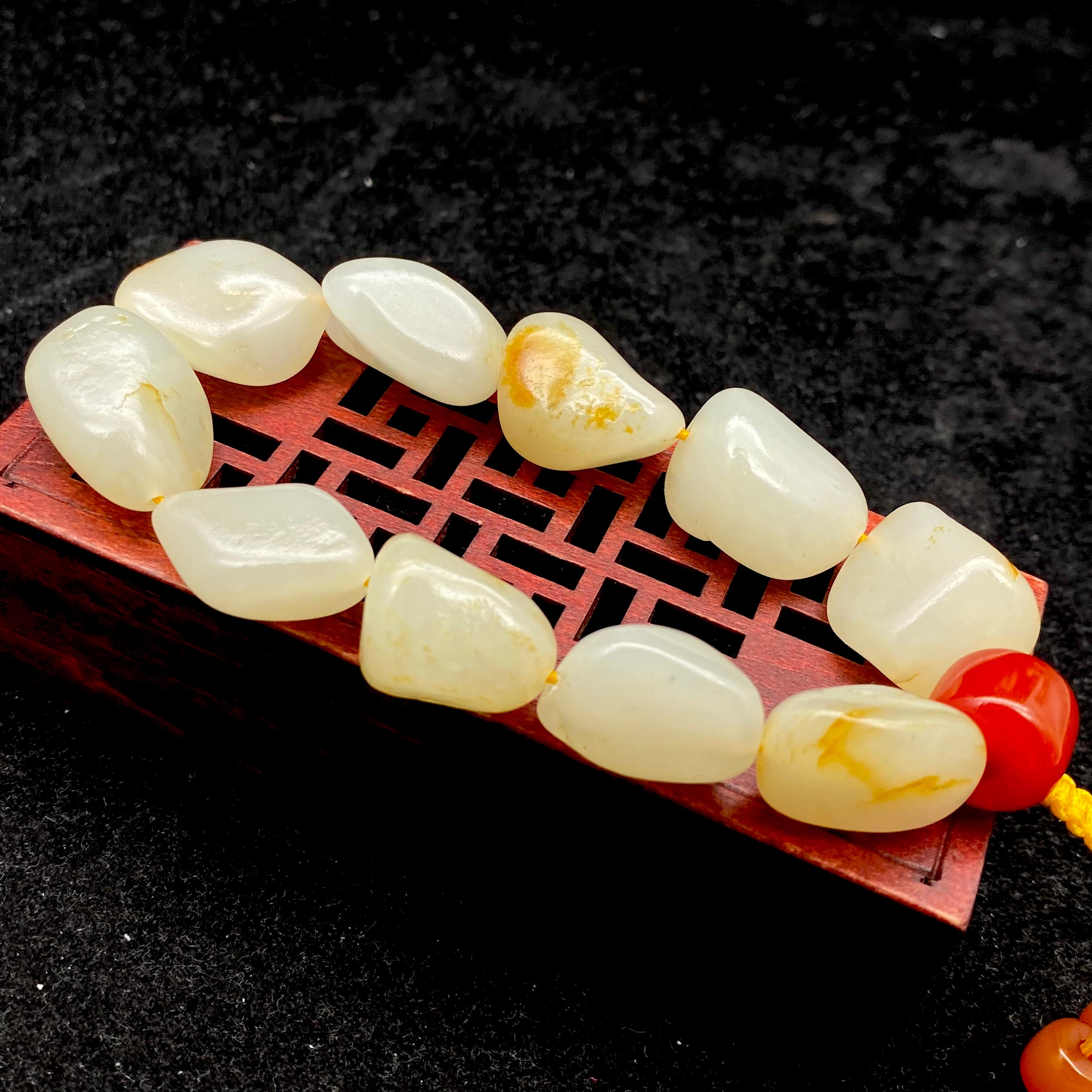 和田玉洒金皮【精品手串】（57.8g） – 厚德载玉