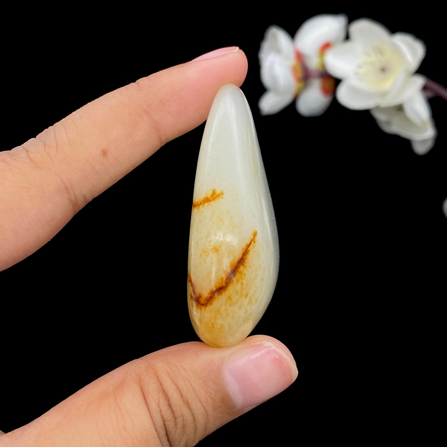 和田玉洒红皮籽料挂件(50.2g)