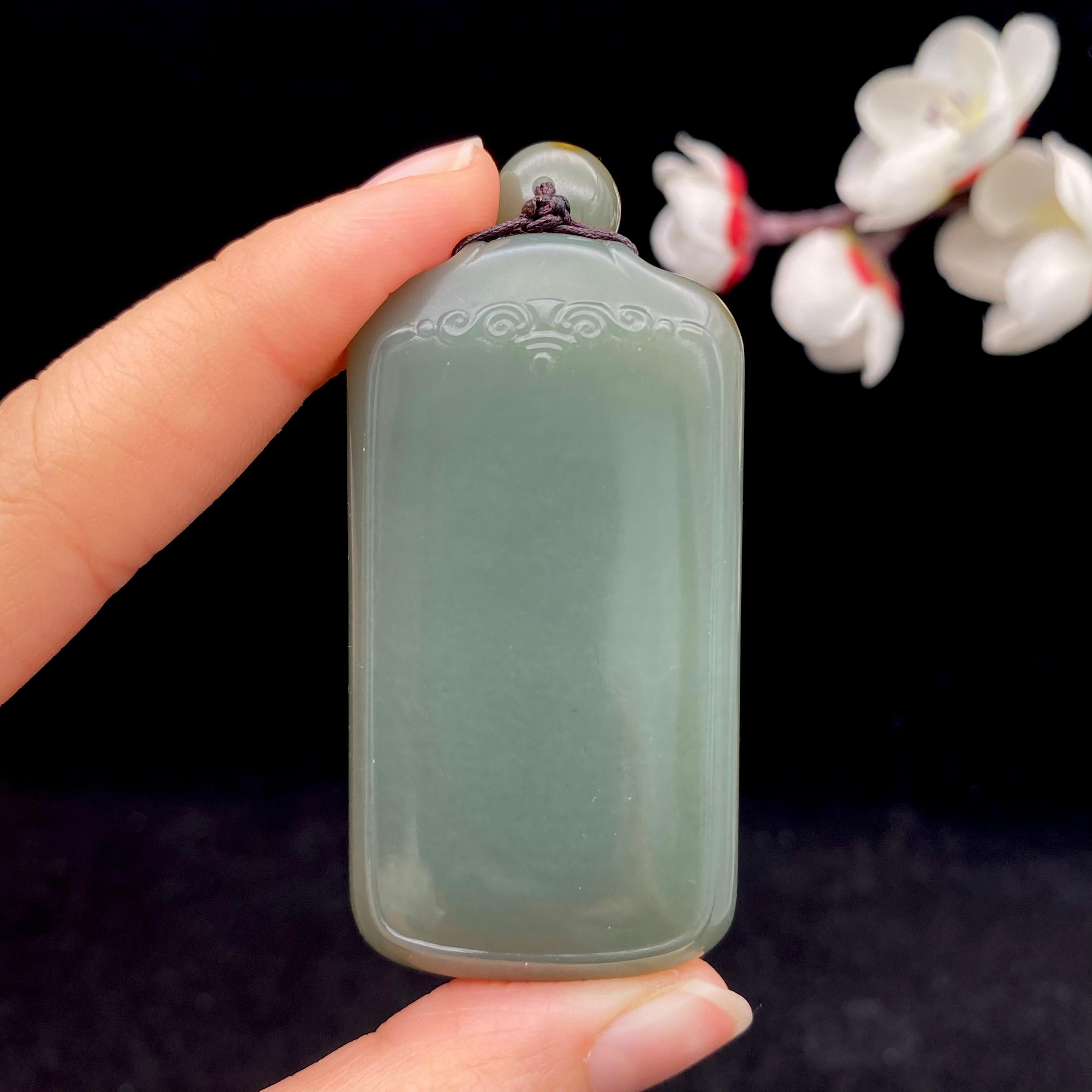 和田玉沙枣青籽料【无事牌】（55.8g） – 厚德载玉