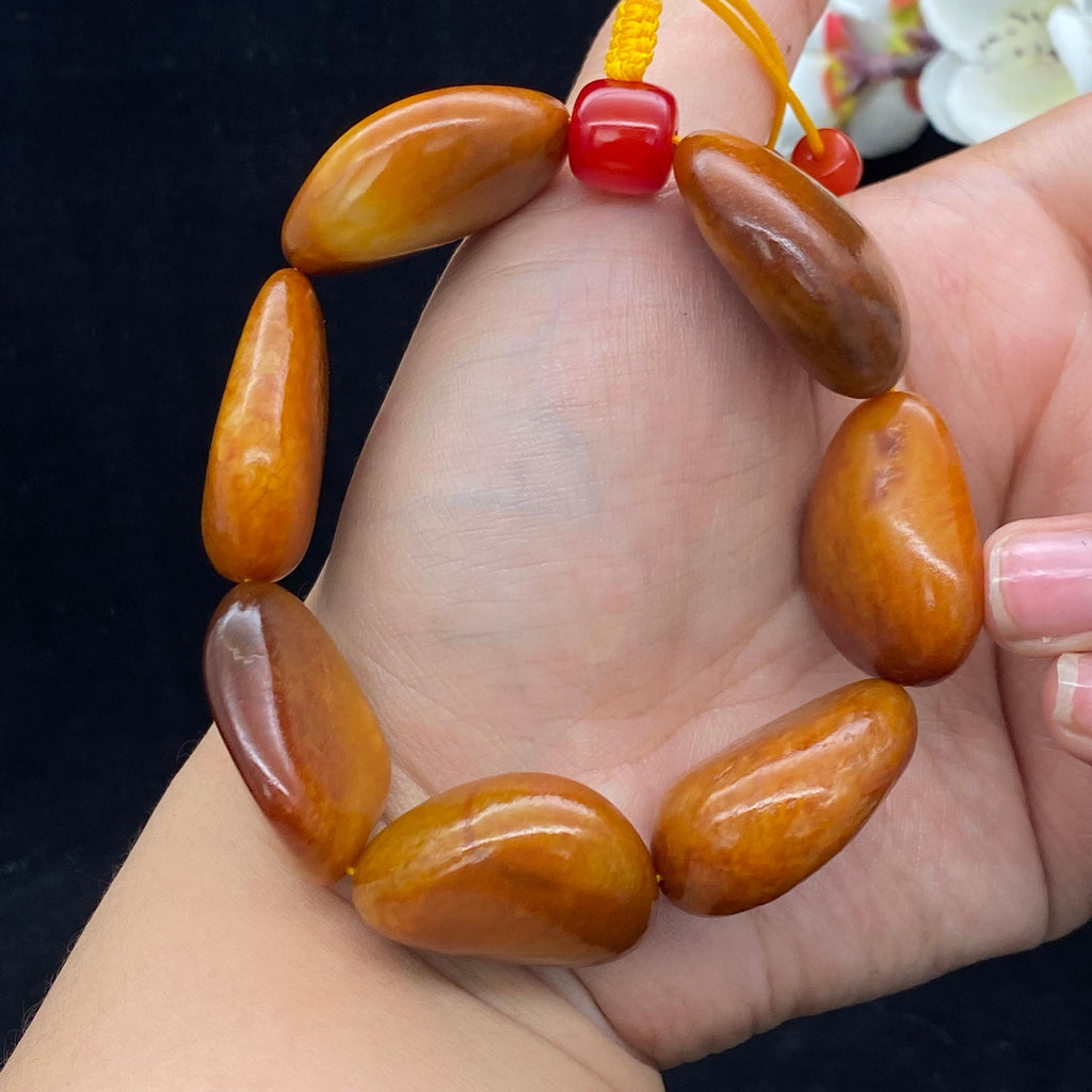 和田玉红沁皮籽料【精品手串】（103.3g）