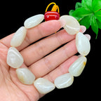 和田玉白玉带黄皮籽料【精品手串】（57.4g）