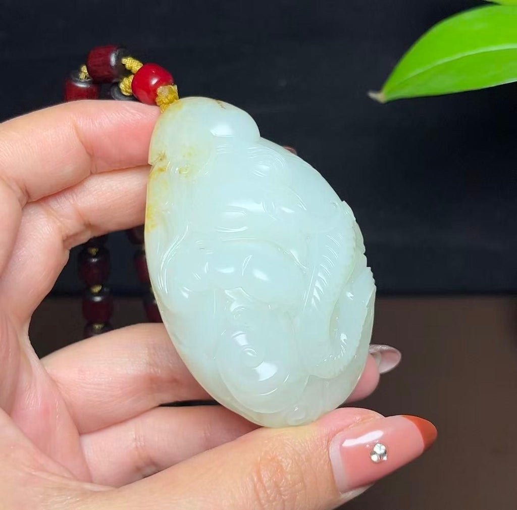 新疆和田玉籽料秋梨皮羊脂玉封侯拜相手把件（133.9g）