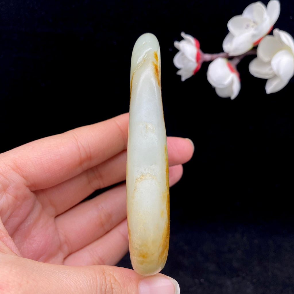 和田玉聚黄皮籽料手把件（133.1g）