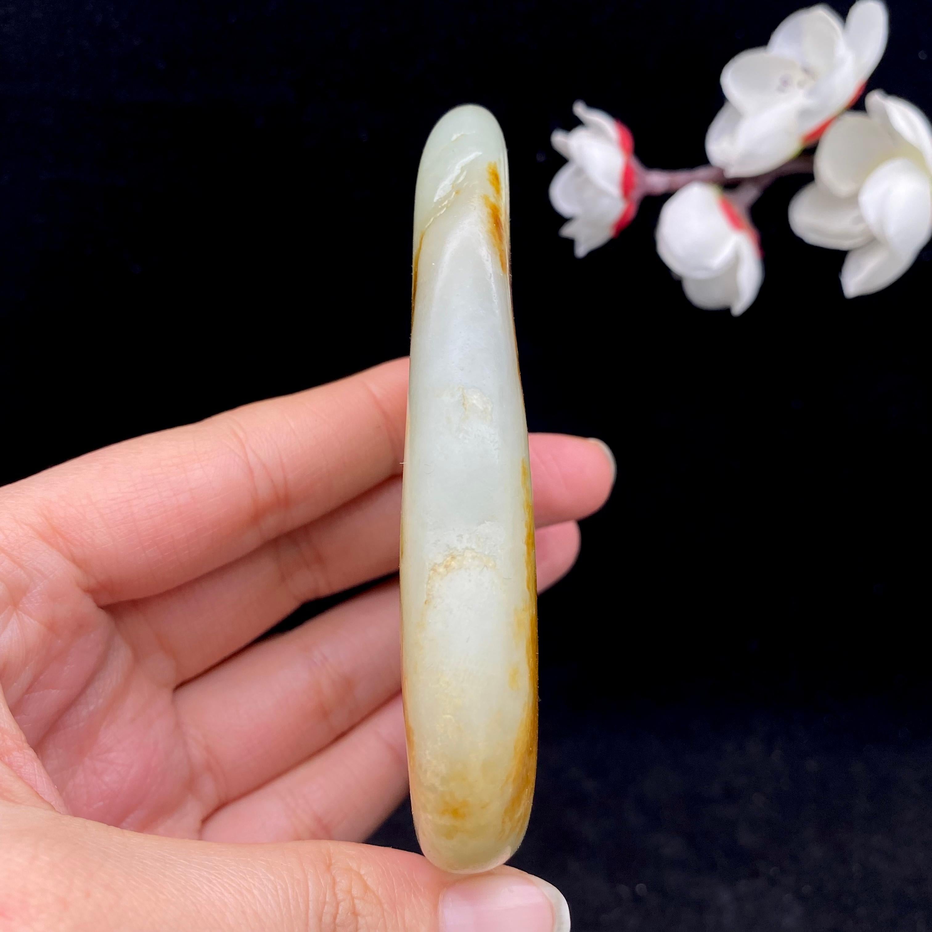 和田玉聚黄皮籽料手把件（133.1g）