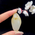 和田玉黄皮籽料原石（25g）