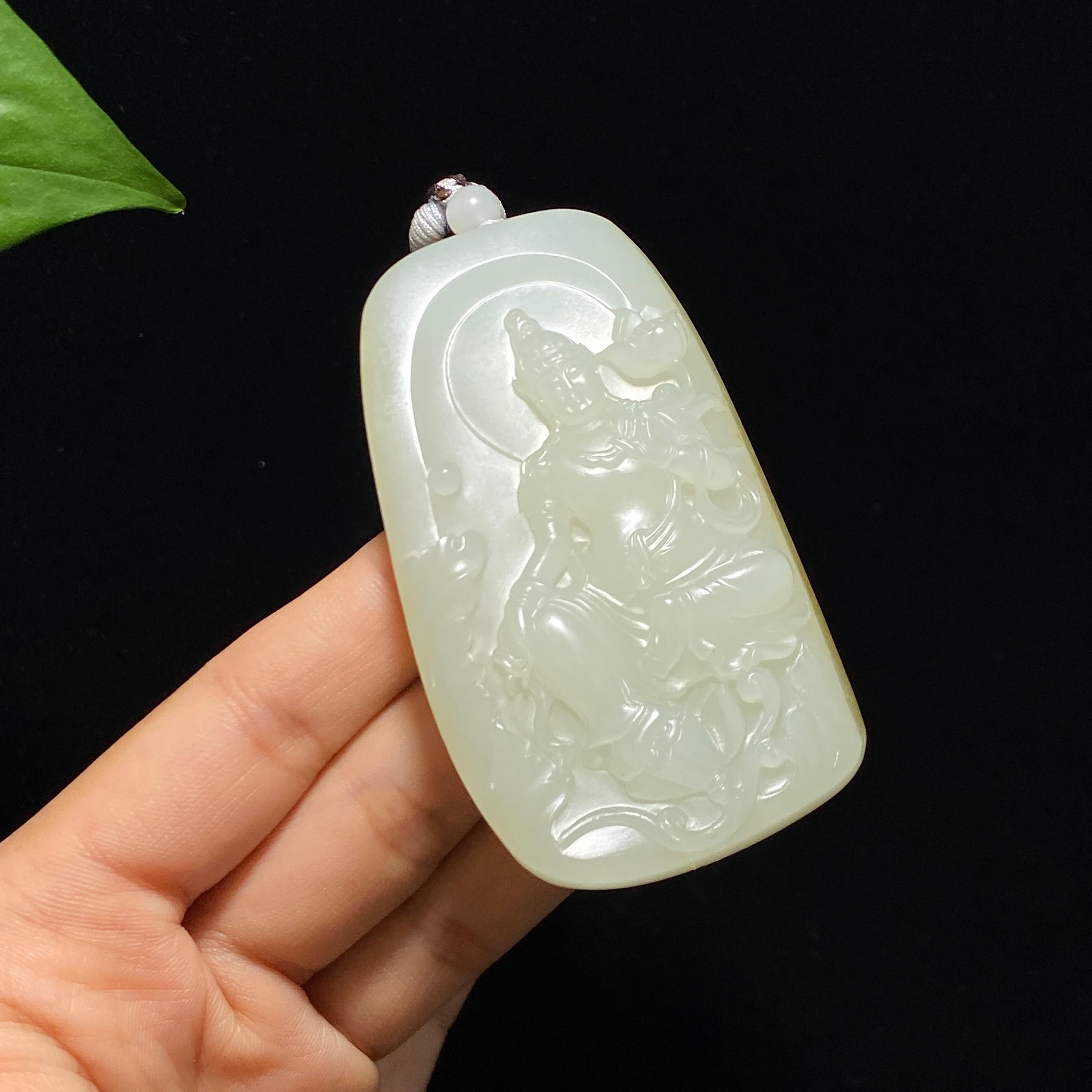 新疆和田玉籽料洒金皮观音牌（83.7g）