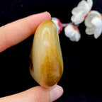 和田玉黄皮带点墨青花籽料（94.1g）