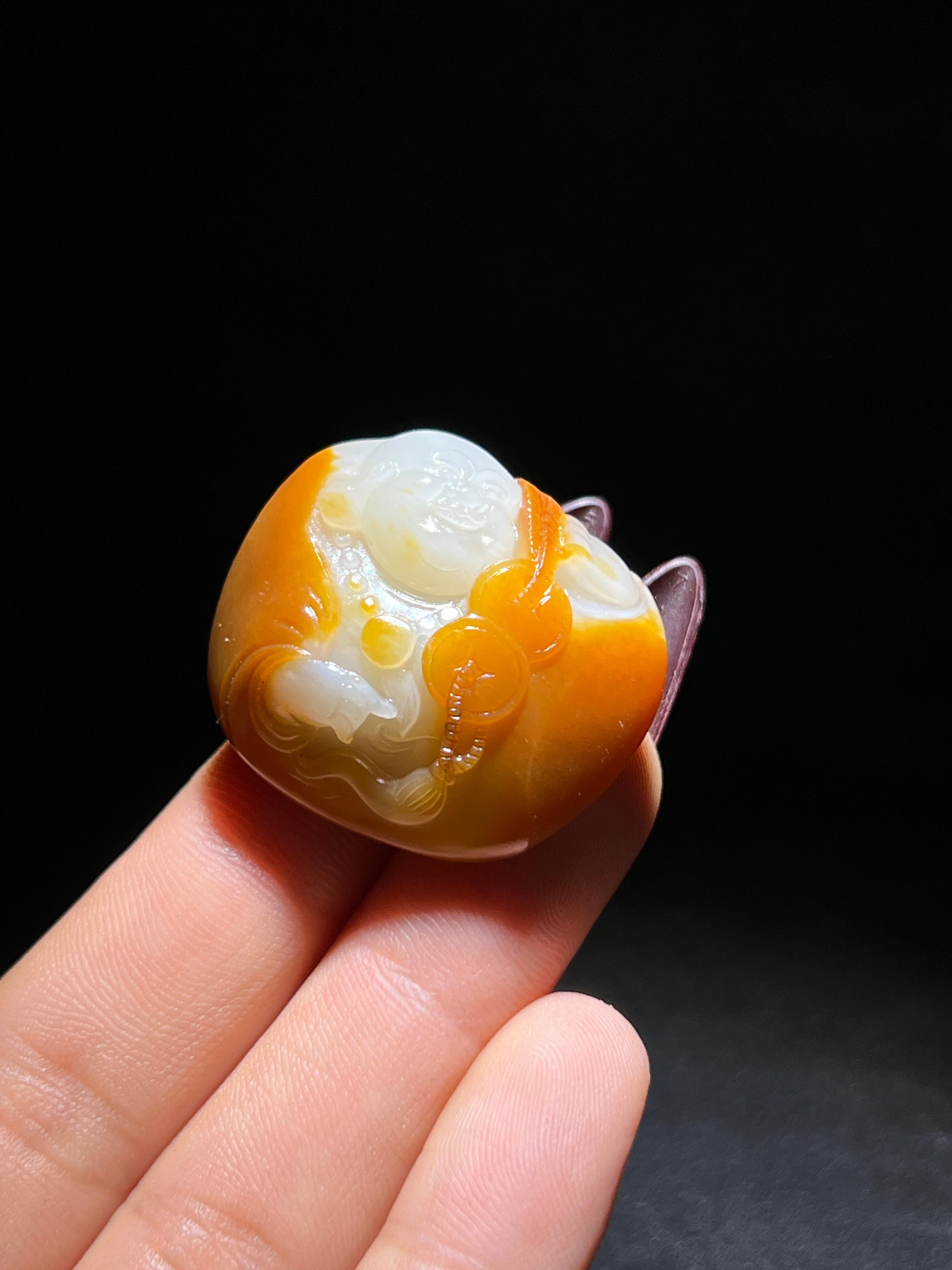 和田玉籽料弥勒的（20.4g）