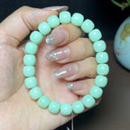 稀少和田玉黑羊洞料薄荷绿老型珠手串（34.1g）