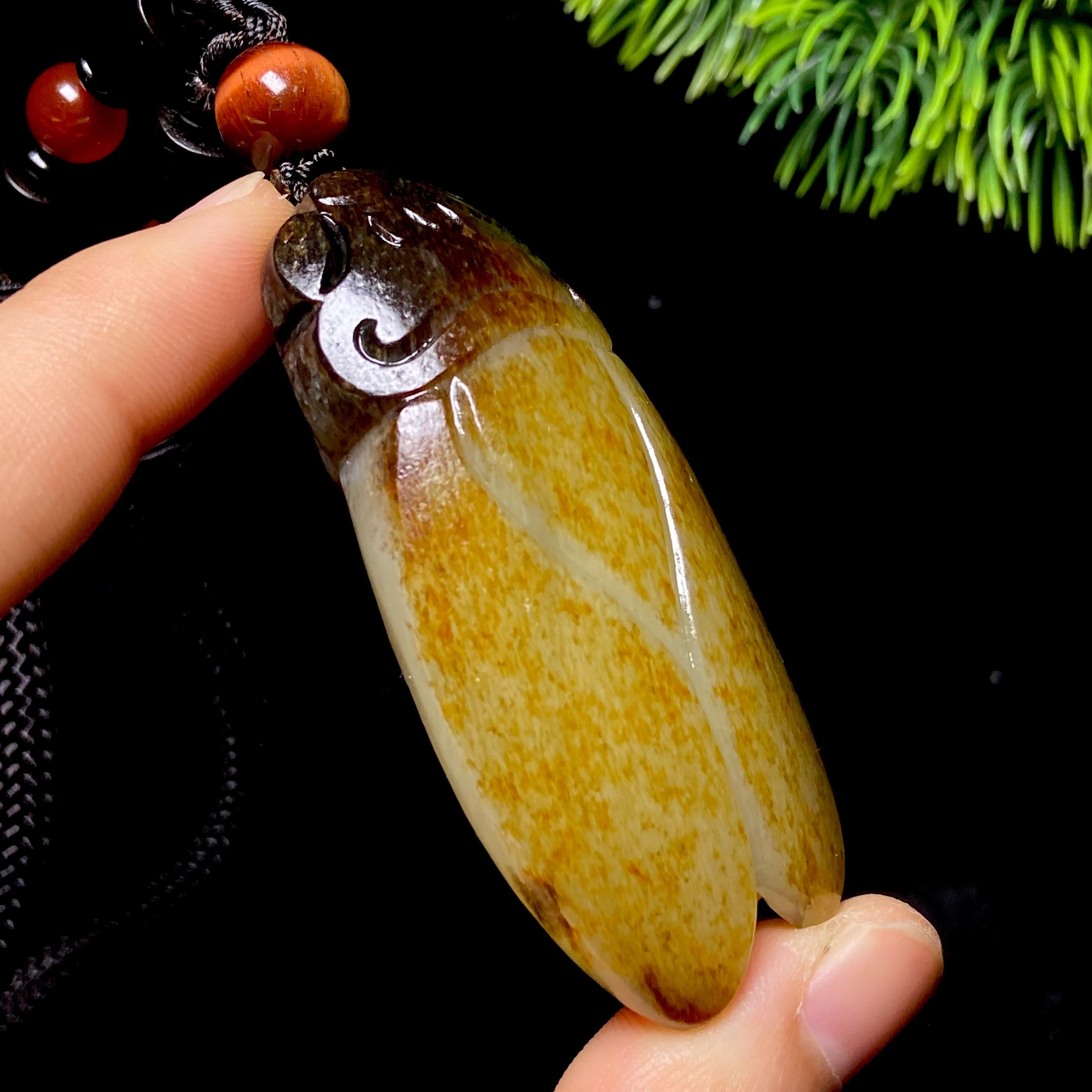 和田玉籽料一鸣惊人把件（63.0g）