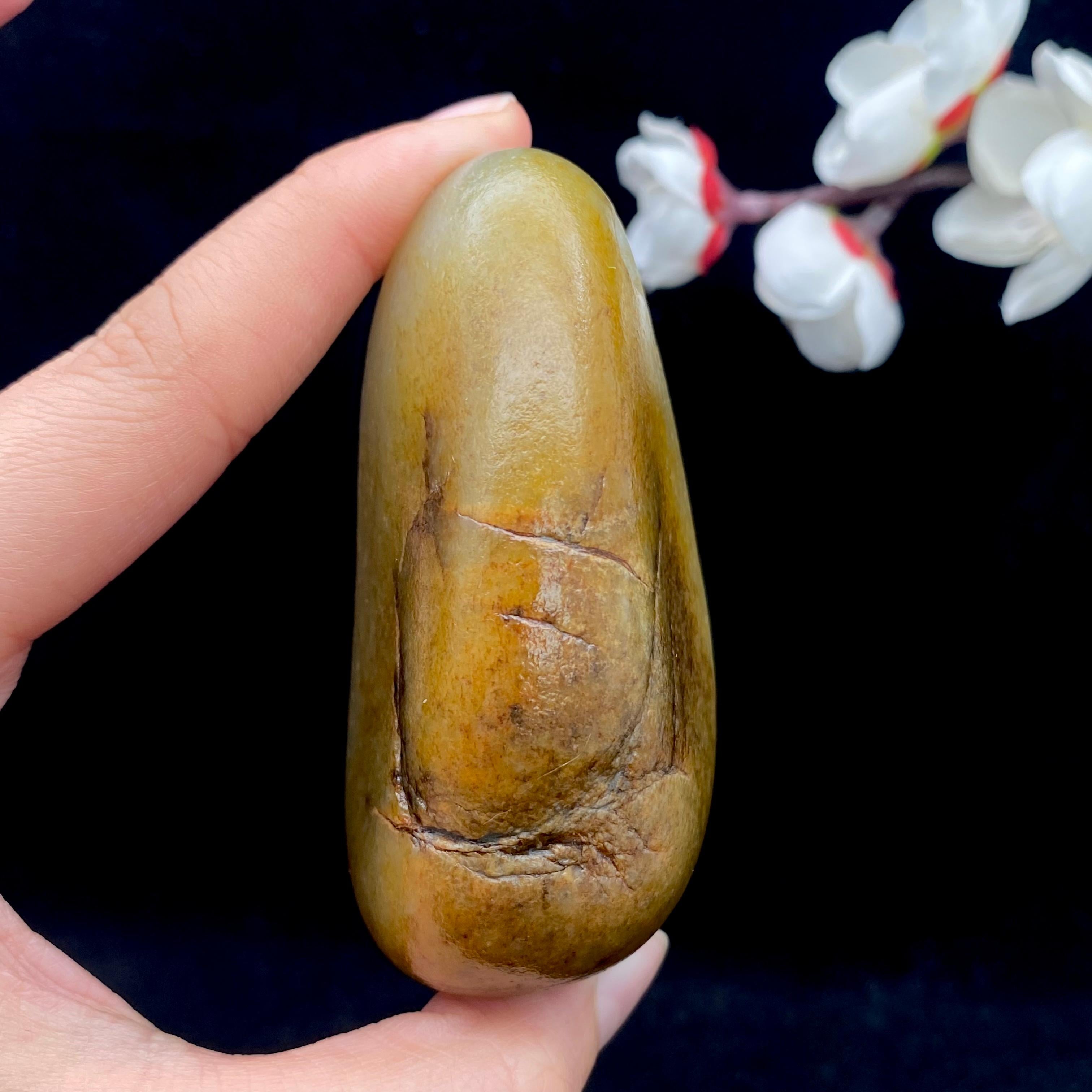 和田玉聚黄皮籽料手把件（230g）