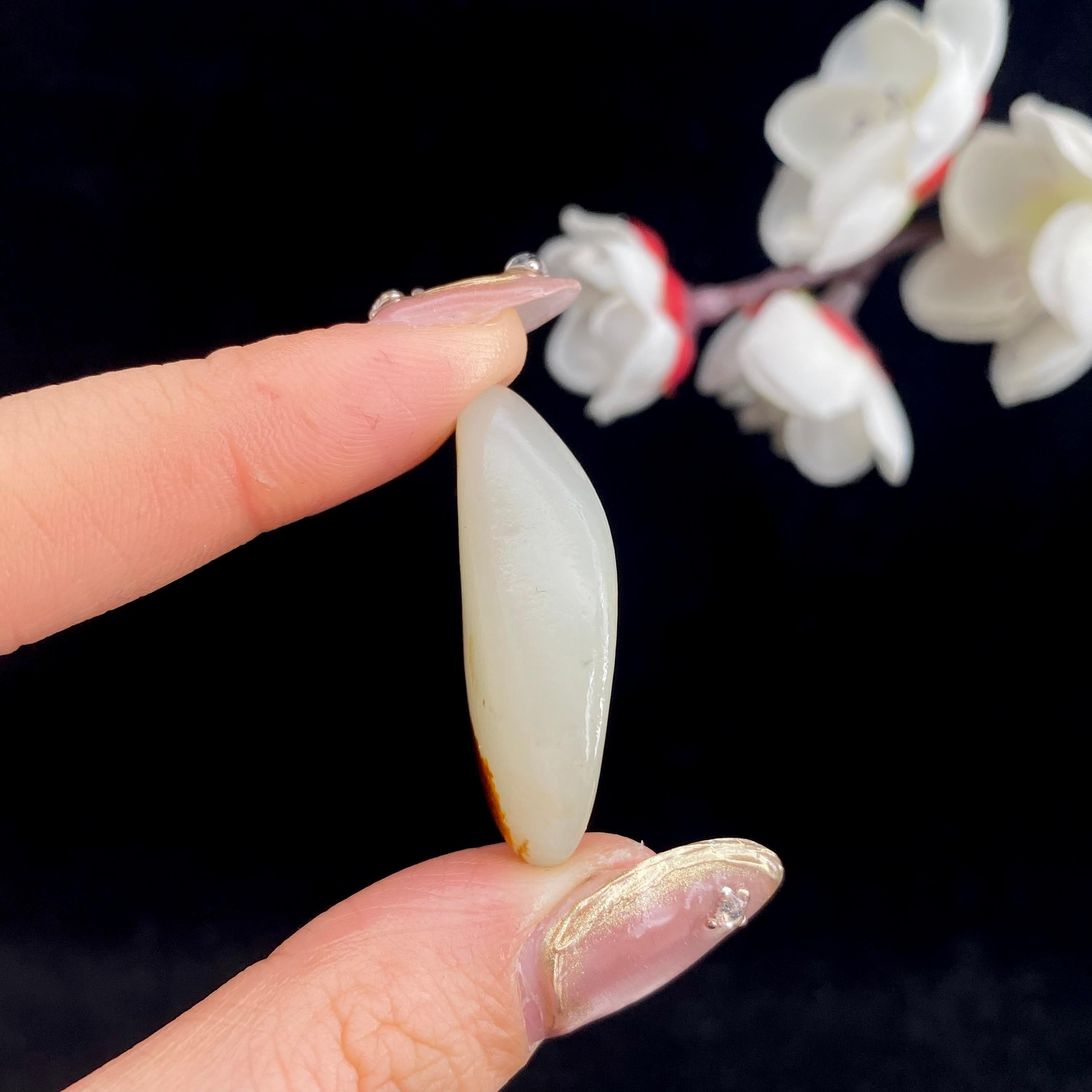 和田玉聚红皮籽料原石（9.1g）