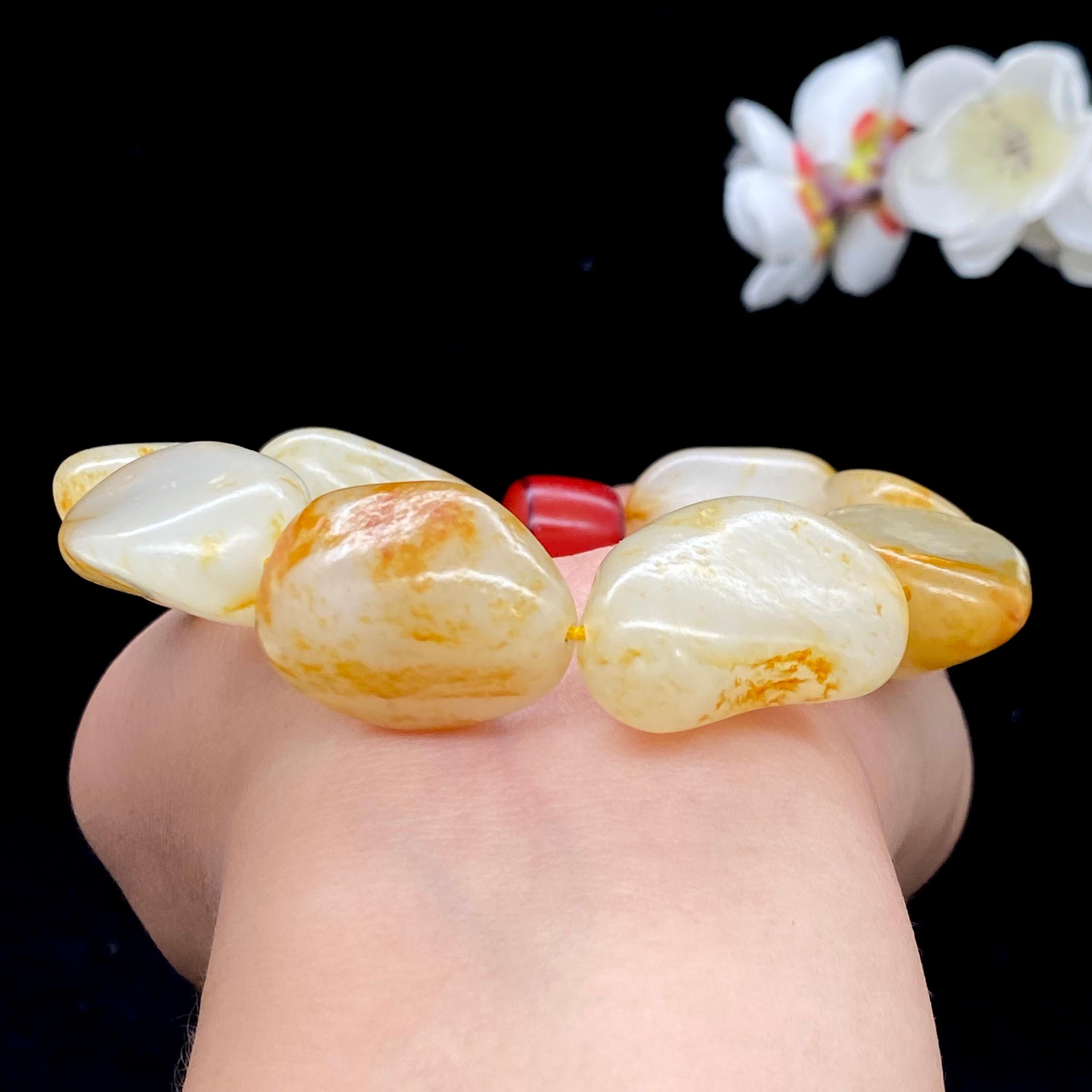 和田玉洒红皮籽料【精品手串】（88.1g）