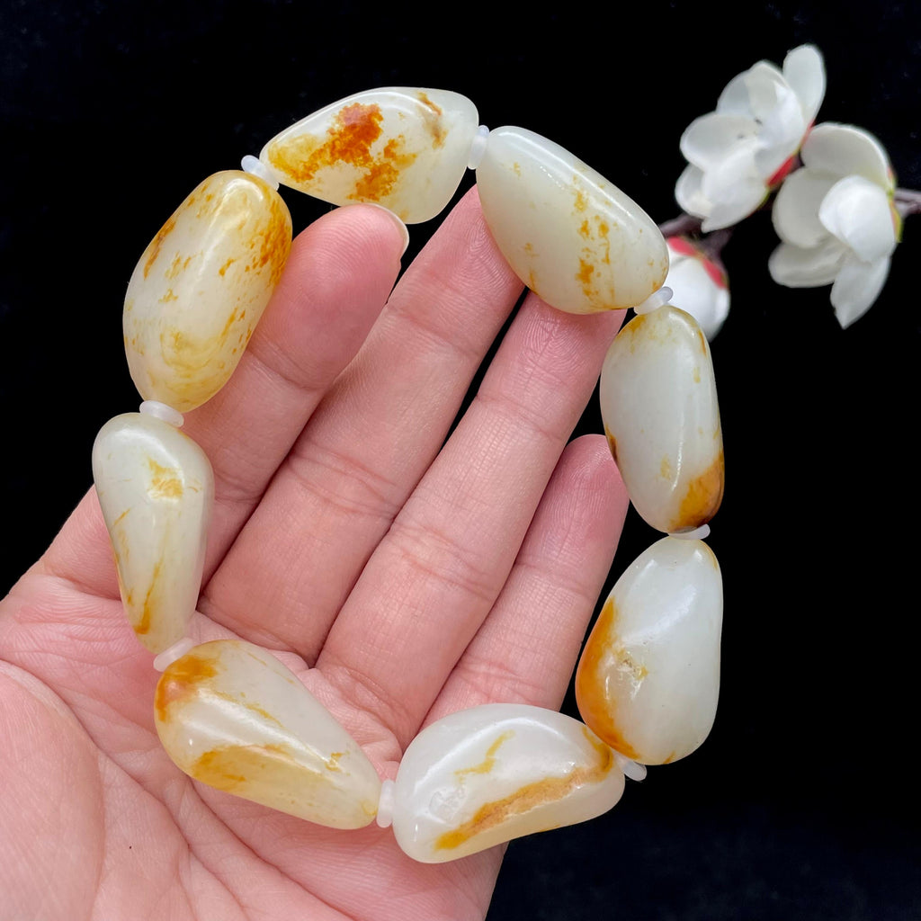 和田玉聚黄皮籽料【精品手串】（76.1g）