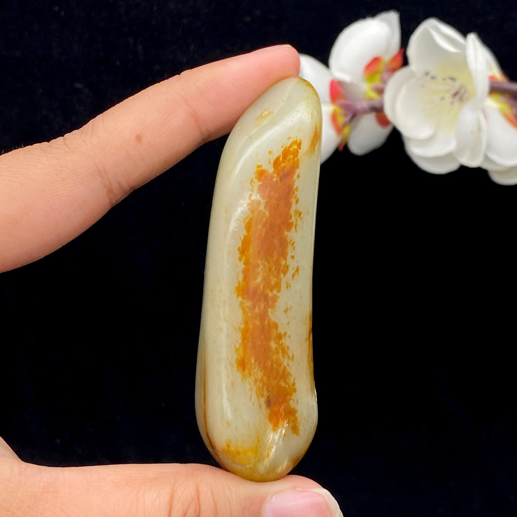 和田玉聚黄皮籽料手把件（77.4g）