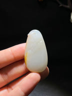 和田玉籽料凤穿牡丹（19.7g）