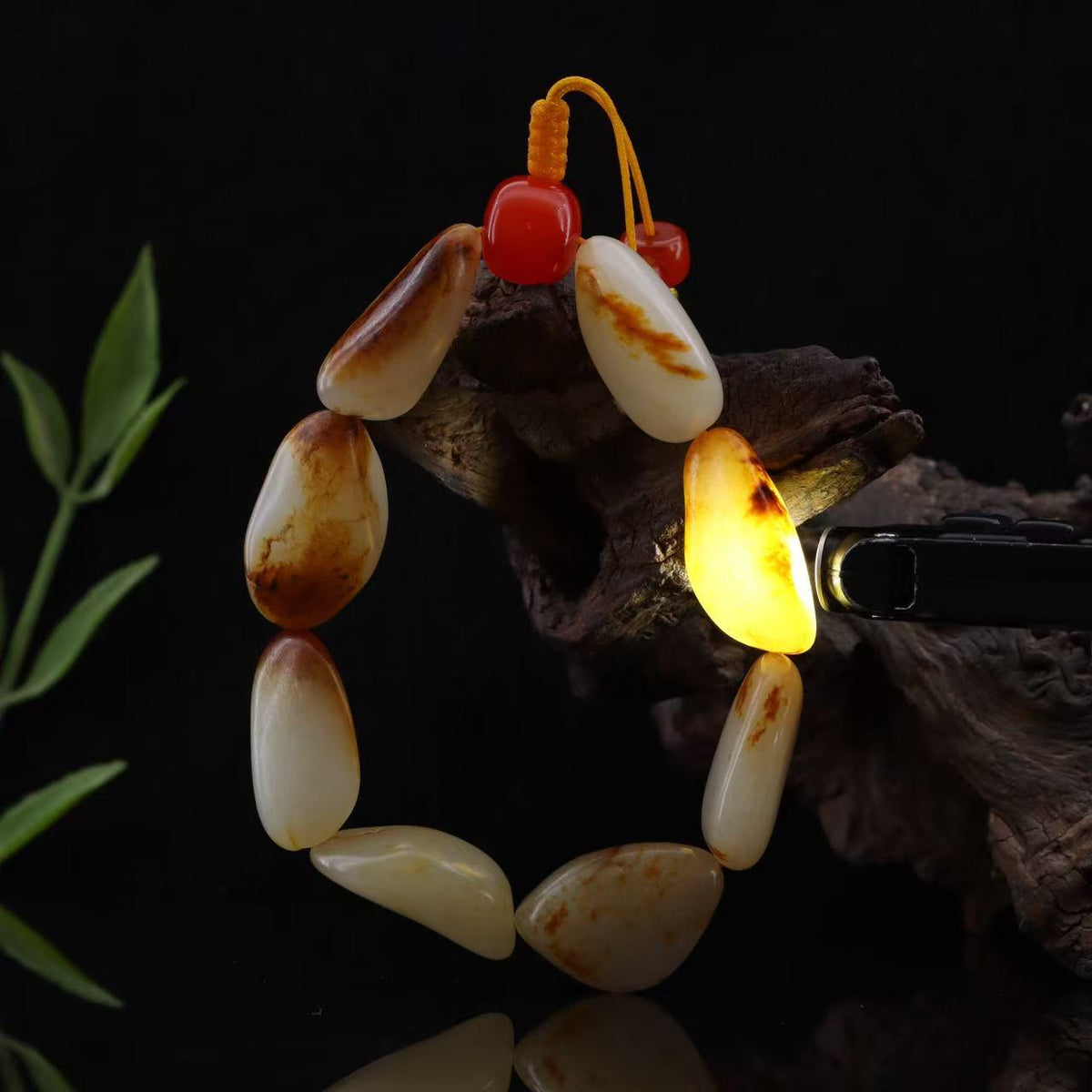 和田玉聚黄皮籽料【精品手串】（76.3g）