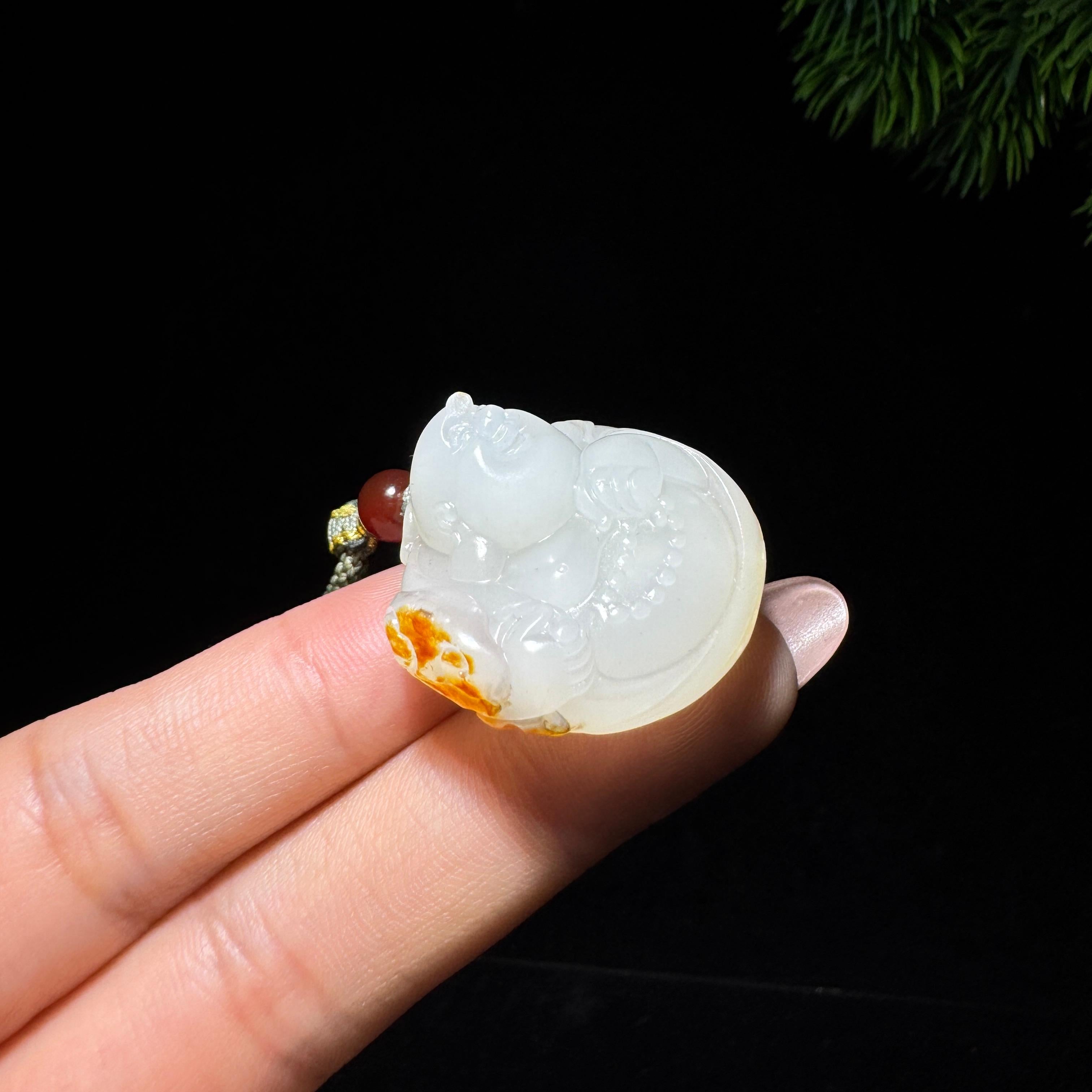 和田玉籽料红皮佛公（19.7g）