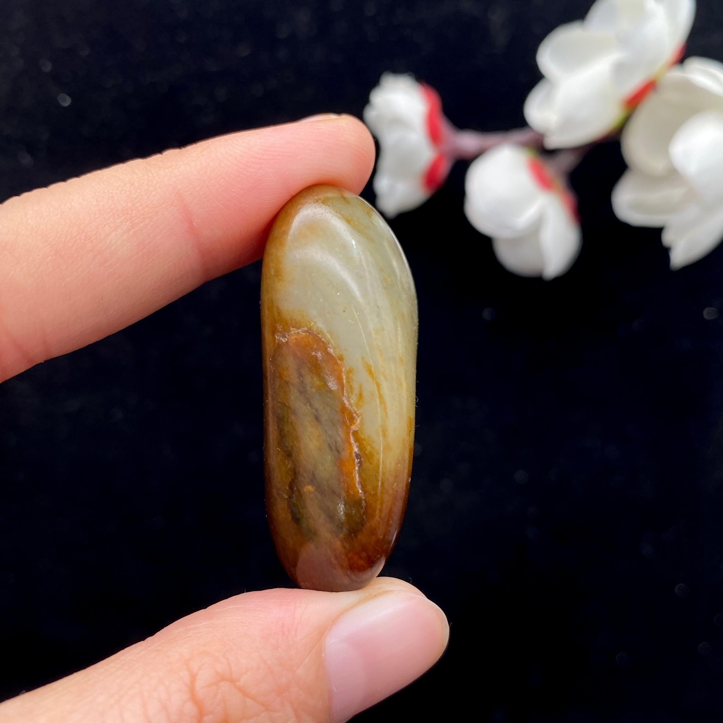 和田玉聚黄皮籽料挂件（27.4g）
