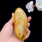 和田玉洒红皮籽料原石（589.5g）