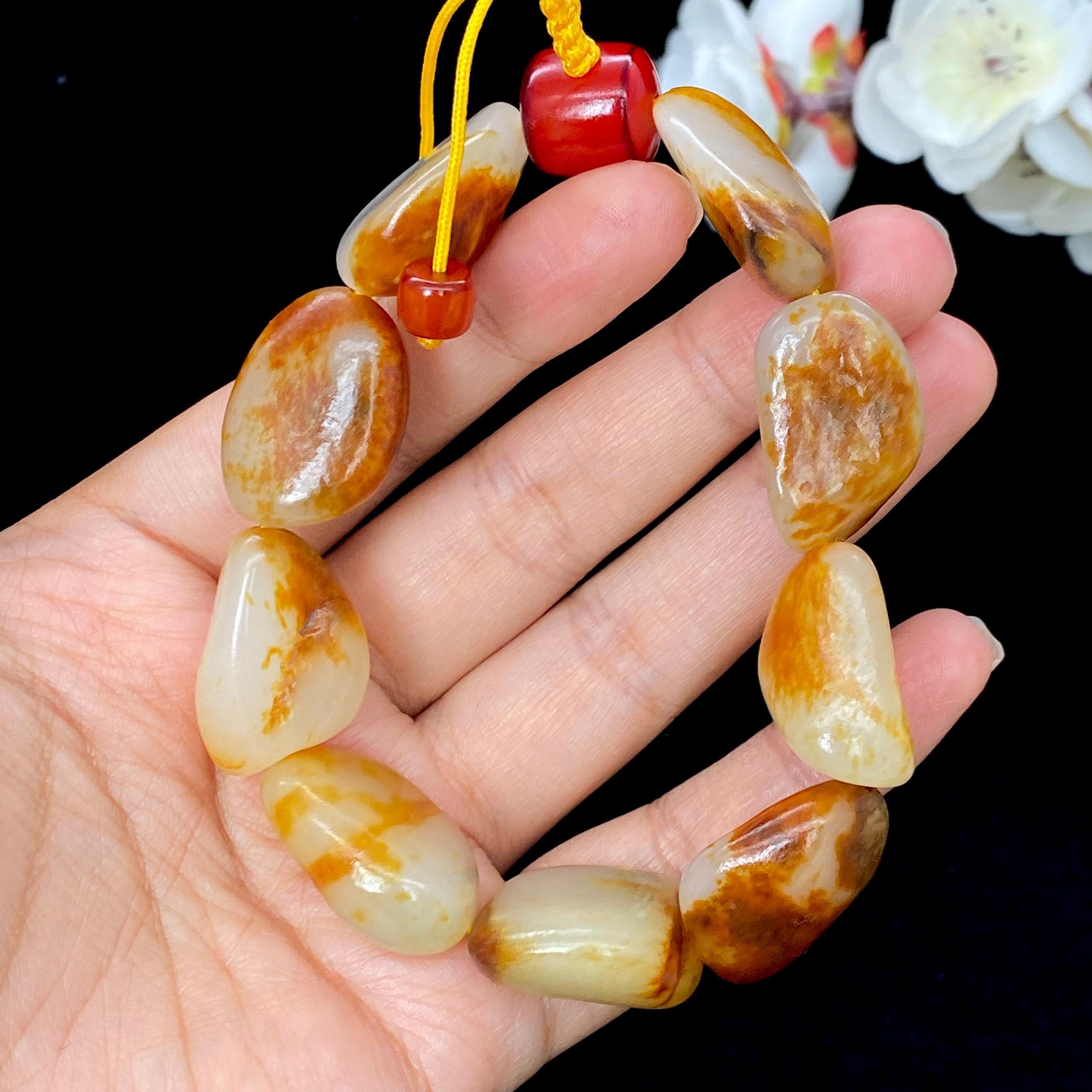 和田玉-红皮白肉籽料【精品手串】（70.9g）