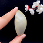 和田玉-聚黄皮青花底籽料手把件