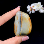 和田玉-聚黄皮青花籽料手把件