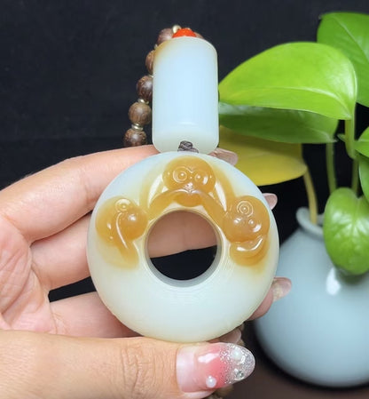 新疆和田玉且末糖羊脂玉三不猴手把件扳指