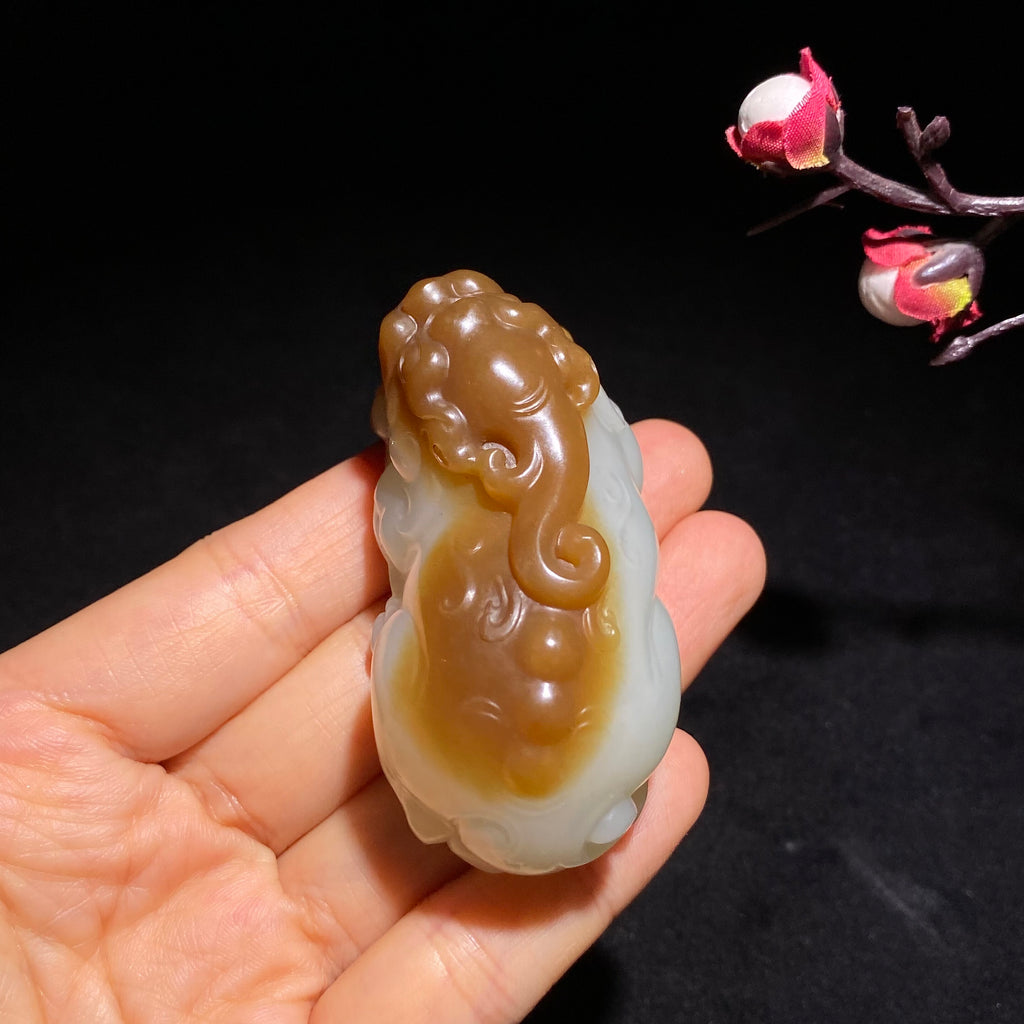 新疆且末羊脂糖白玉貔貅手把件