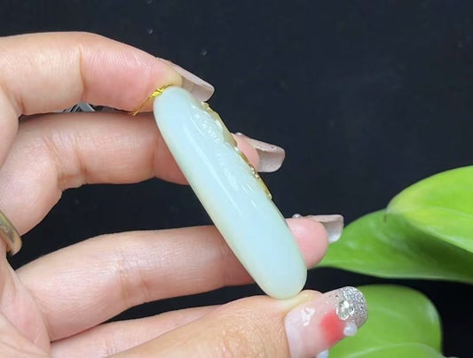 和田玉且末糖羊脂玉凤凰观音