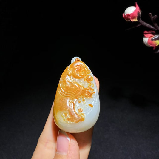 收藏级玉龙喀什河籽料聚红皮佛公挂件