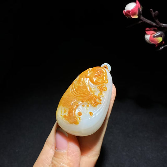 收藏级玉龙喀什河籽料聚红皮佛公挂件