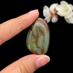 和田玉-沙枣青带黄皮籽料原石（12.2克）