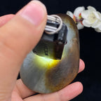 和田玉-聚黄皮青花籽料手把件（220.6克）