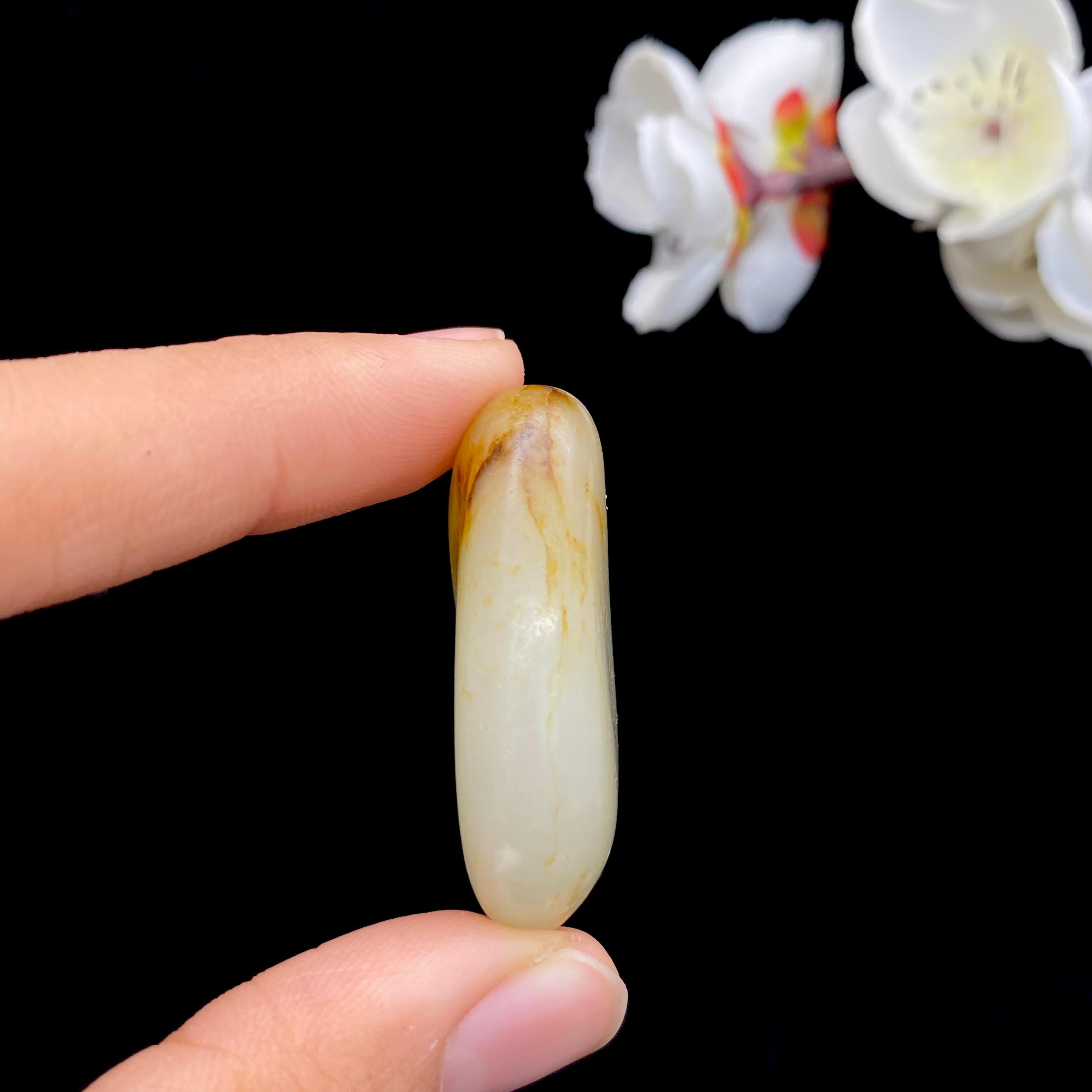 和田玉黄皮籽料原石（21.1g）