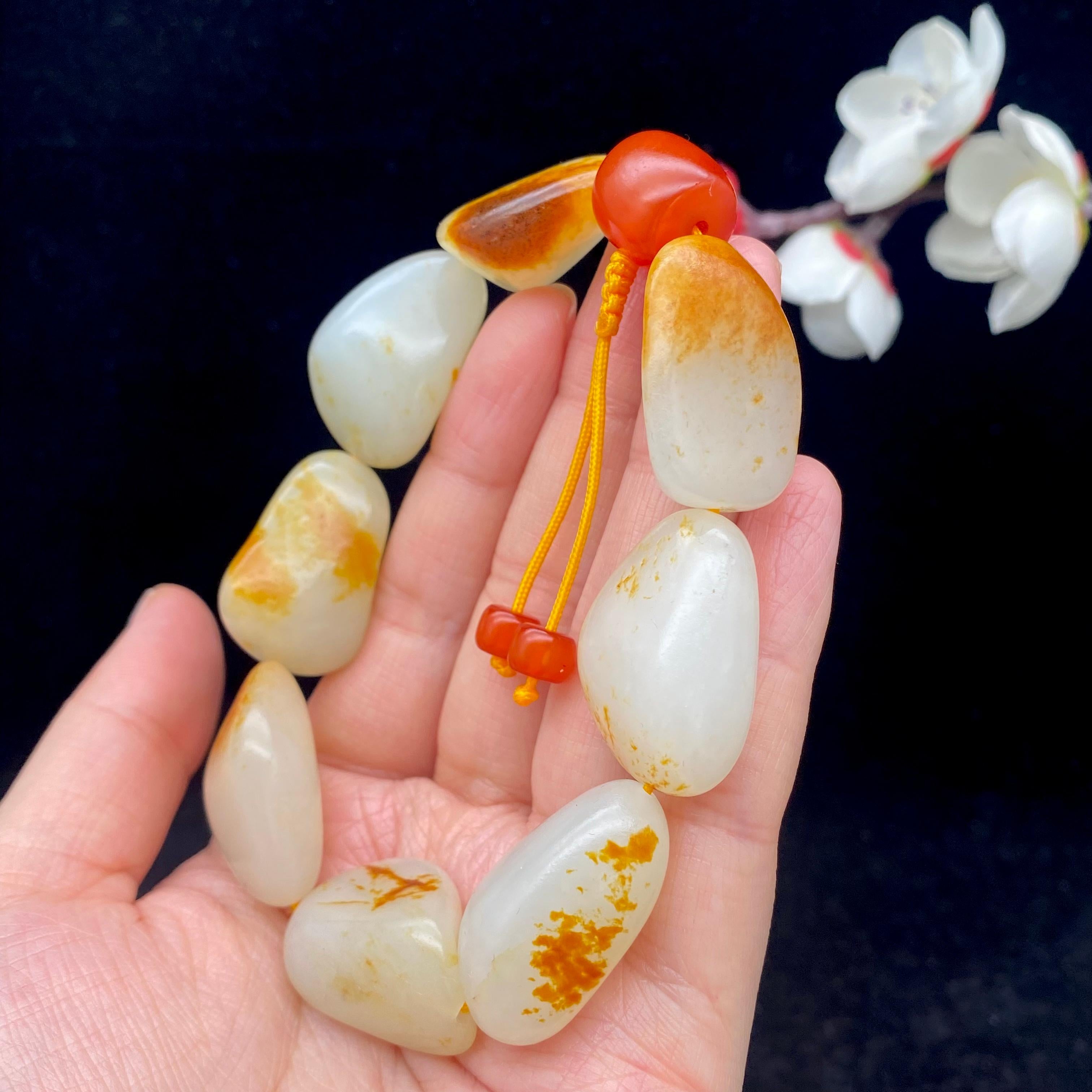 和田玉洒红皮籽料【精品手串】（75.9g）