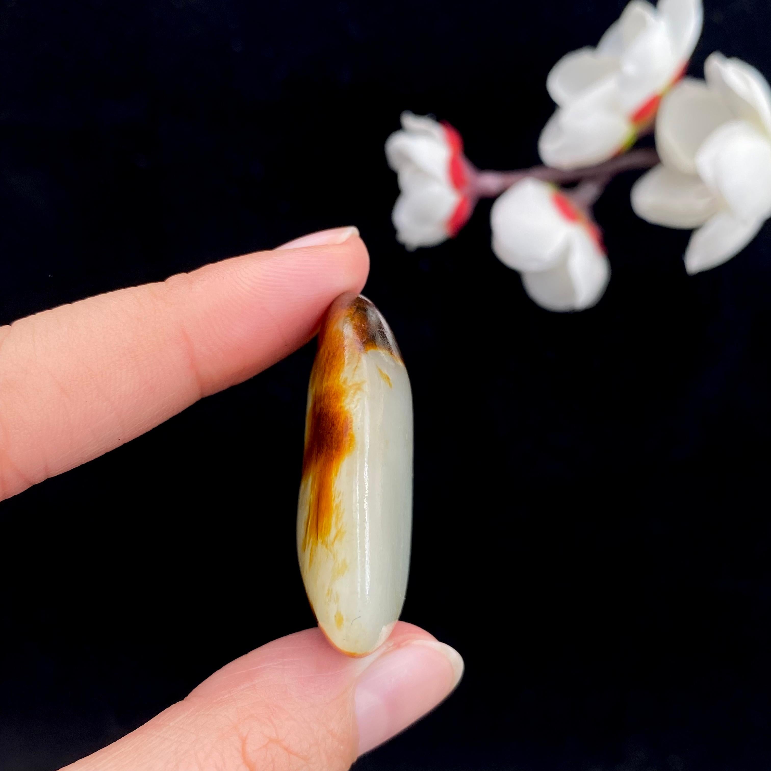 和田玉聚红皮籽料原石（20.2g）