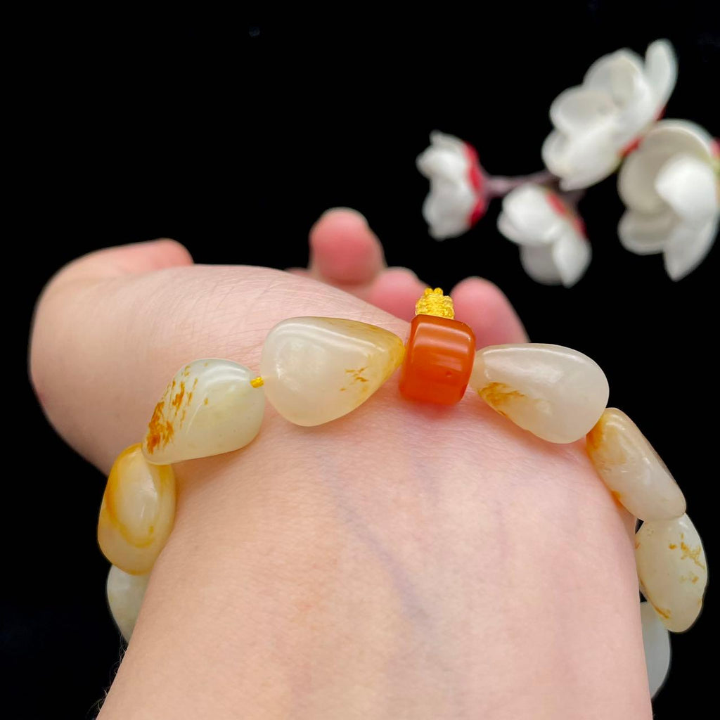 和田玉洒红皮籽料【精品手串】（33.2g）
