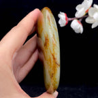 和田玉聚黄皮籽料手把件（220.4g）